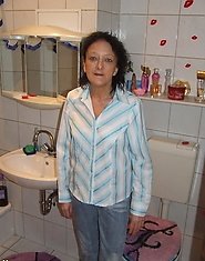 mature slut caught changing clothes in the bathroom